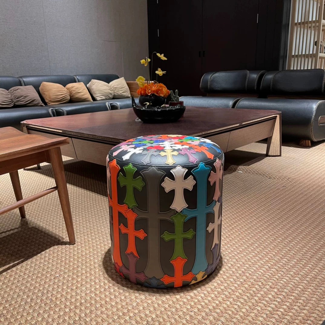 black chrome cross ottomon stool for furniture showroom.